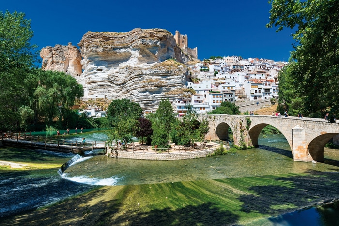 Alcalá del Júcar, Spain with a bridge and river