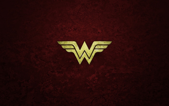Wonder Woman Logo on Textured Red Background
