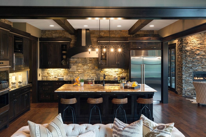 Luxury kitchen with stone accents and island