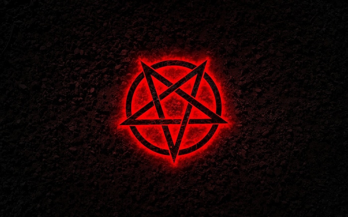 Red pentagram on a dark textured background