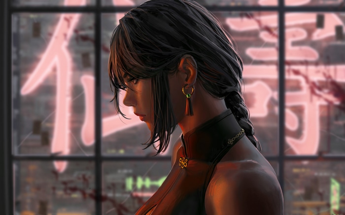 Woman with braided hair in a dark dress
