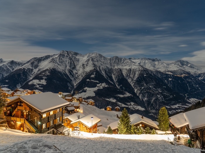 4K snow village in mountains at night