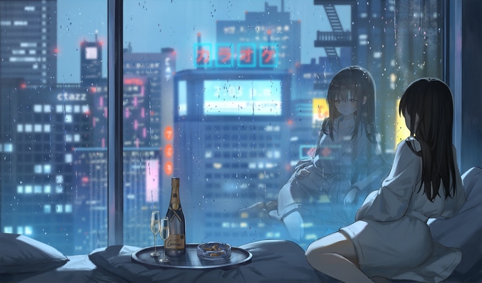Girl in bathrobe by window with city view and champagne