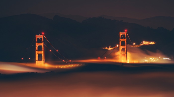Golden Gate Bridge at night with fog