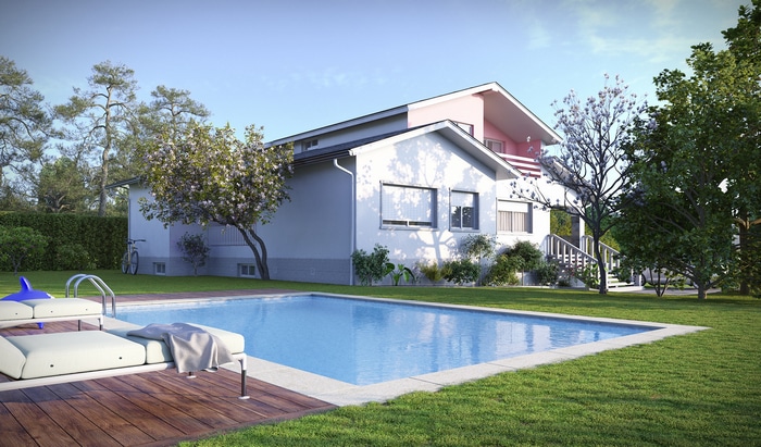 House with swimming pool and lounge chairs
