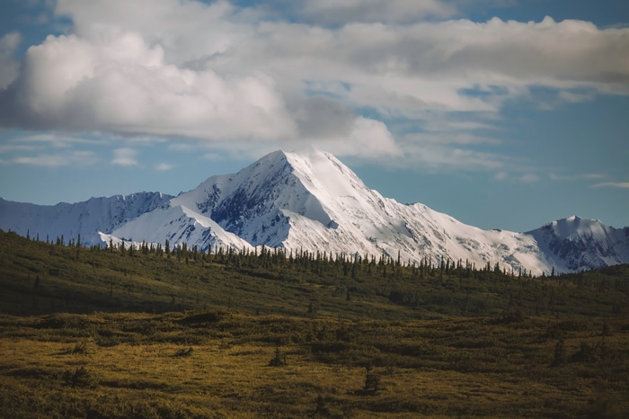 4K snowy mountain landscape with clouds