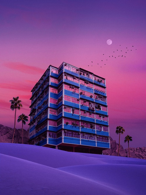 Blue building in a purple desert landscape