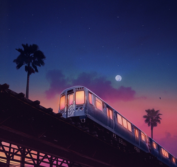 Subway train on a railway at night with palm trees