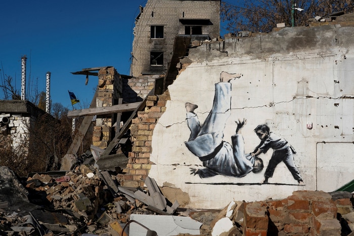 Banksy mural of judo match in destroyed building in Ukraine