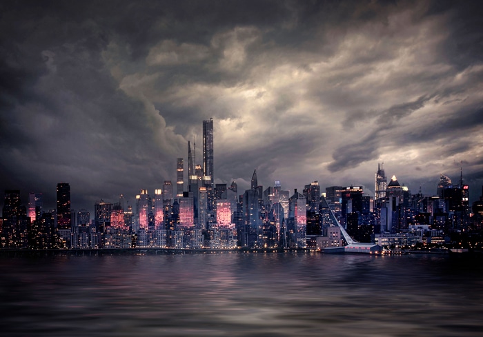 4K Cityscape at Night with Stormy Clouds