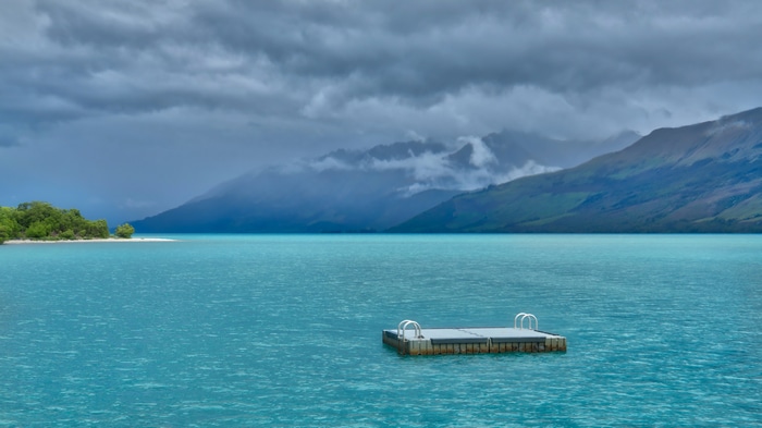 4K New Zealand Mountains and Lake with Floating Dock