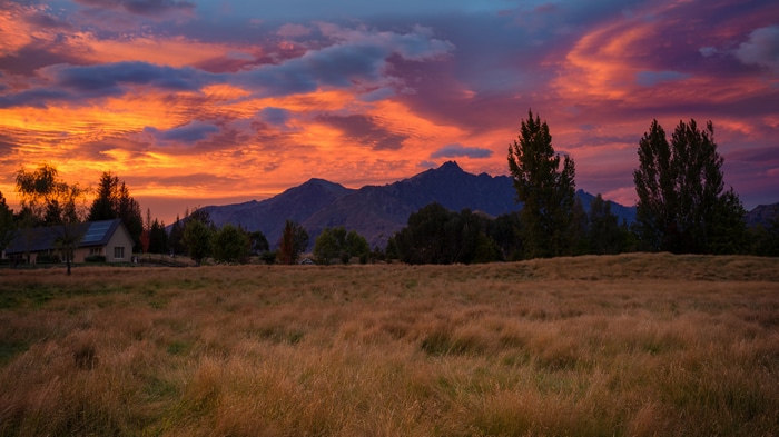 4K New Zealand sunset over mountains and landscape