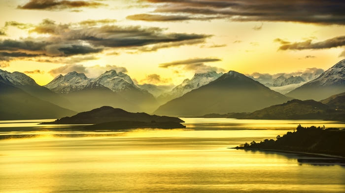 4K Landscape of Snowy Mountains and Lake at Sunset