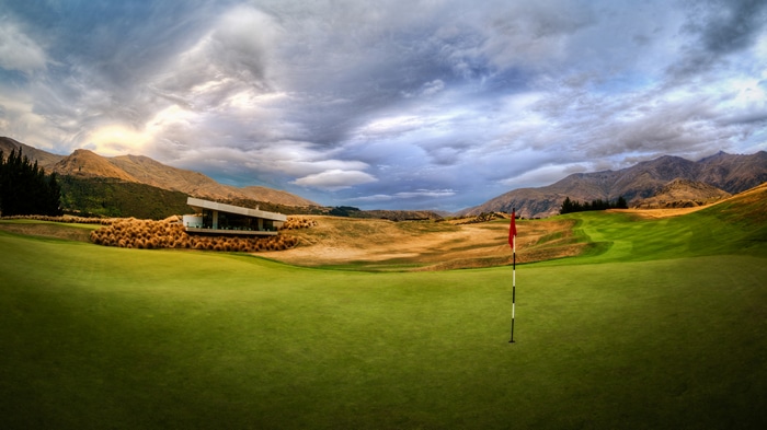 4K Golf Course in Queenstown, New Zealand with Mountains and Clouds
