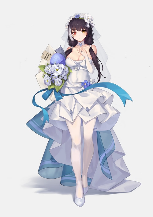 Bride in a white wedding dress holding flowers