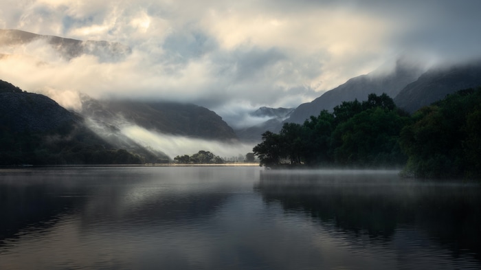 Misty lake and mountains in Wales