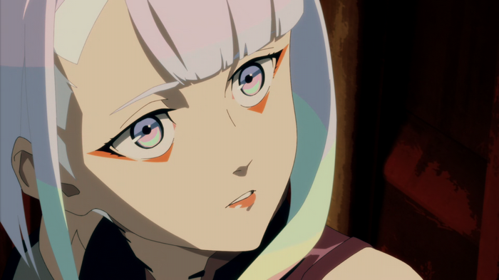 Lucy from Cyberpunk: Edgerunners looking intently