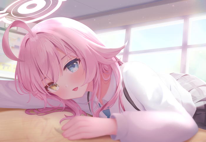 Takanashi Hoshino from Blue Archive rests her head on a desk