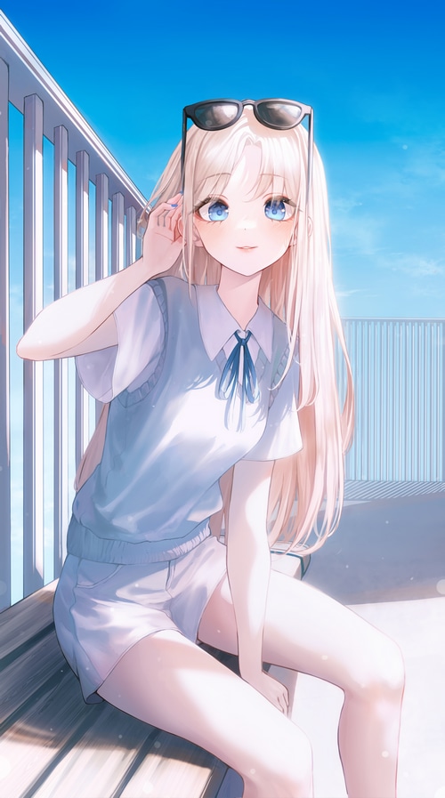 Girl with blonde hair and blue eyes wearing sunglasses