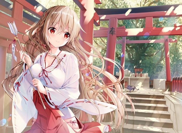 Miko with arrows at a Torii shrine