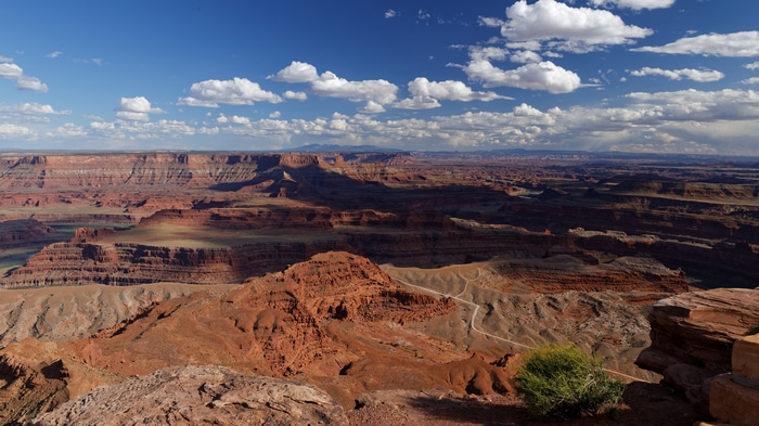 4K Desert Landscape with Canyons and Clouds in USA
