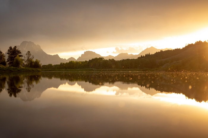 4K sunset over a lake with mountains in Wyoming