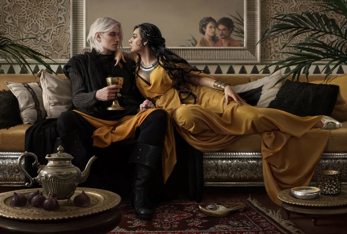 Couple in fantasy attire on a couch