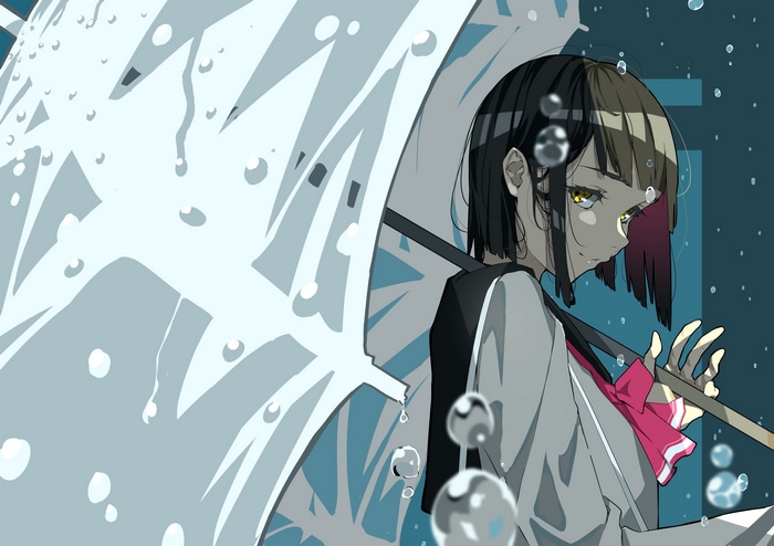 Schoolgirl with umbrella in the rain