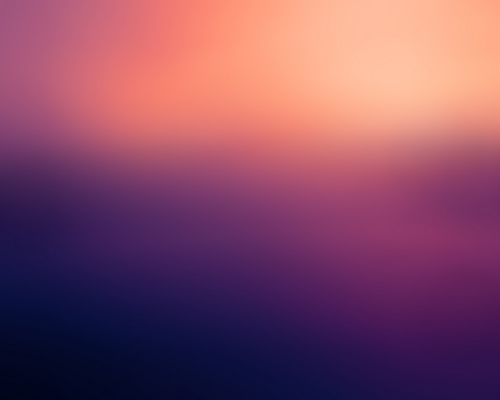 Blurred gradient with peach and purple hues
