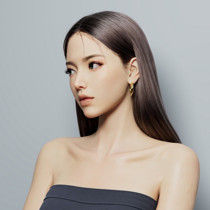 Ling Jie Zeng with straight brown hair and earring
