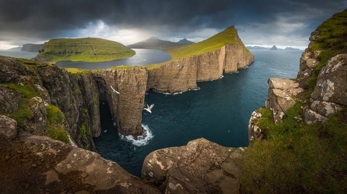 4K Faroe Islands cliffs and sea with birds
