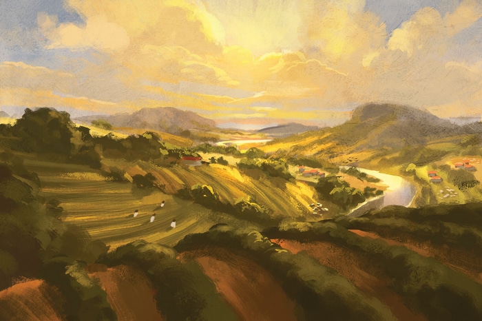 Valley landscape with rolling hills and a river at sunset