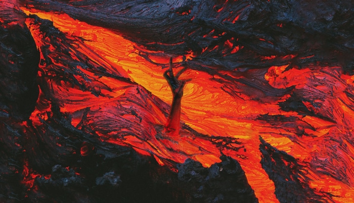 Joji's hand emerging from lava