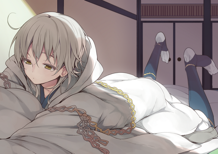 Anime girl with yellow eyes lying on front
