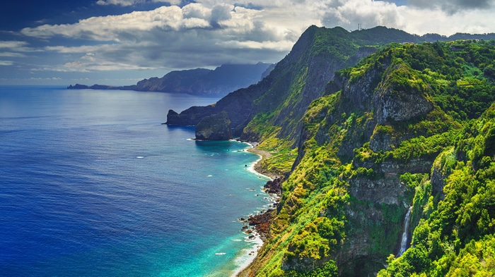 4K Madeira coast with mountains and waterfall