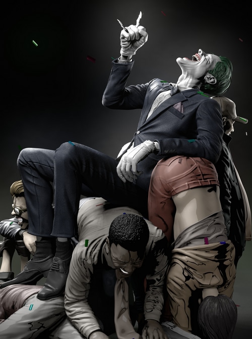 The Joker sitting on defeated figures