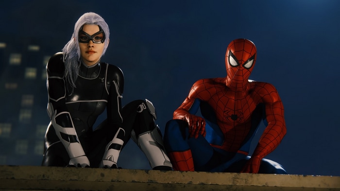 Spider-Man and Black Cat sitting on a ledge
