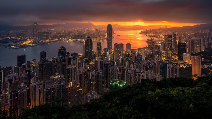 4K Hong Kong cityscape at sunset with clouds