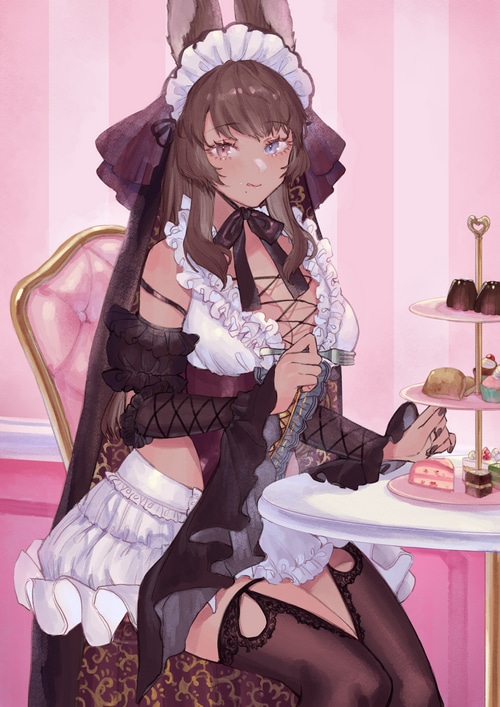Maid with animal ears serving sweets