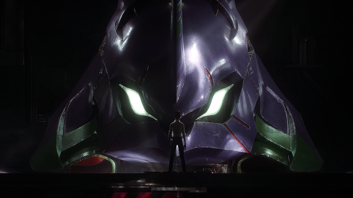 Shinji stands before the giant EVA Unit 01
