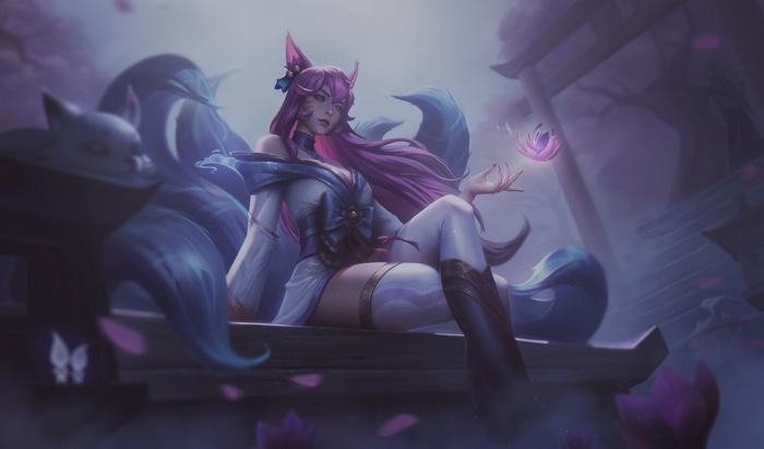 Ahri from League of Legends with fox ears and tails