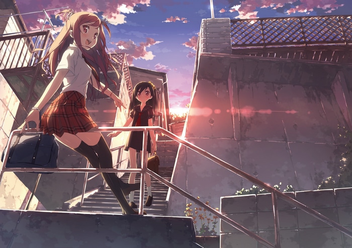 Two schoolgirls on stairs at sunset