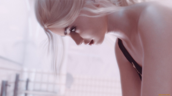 Woman with blonde hair and red lipstick in profile