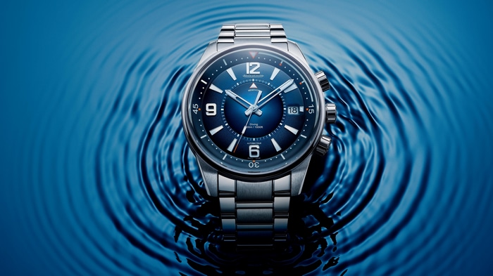 4K Jaeger LeCoultre wristwatch on blue water ripples