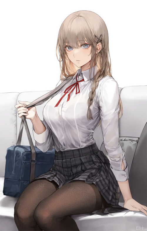 Schoolgirl in uniform with a school bag