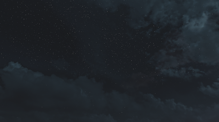 Starry night sky with clouds