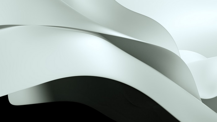 Abstract flowing white shapes on black background