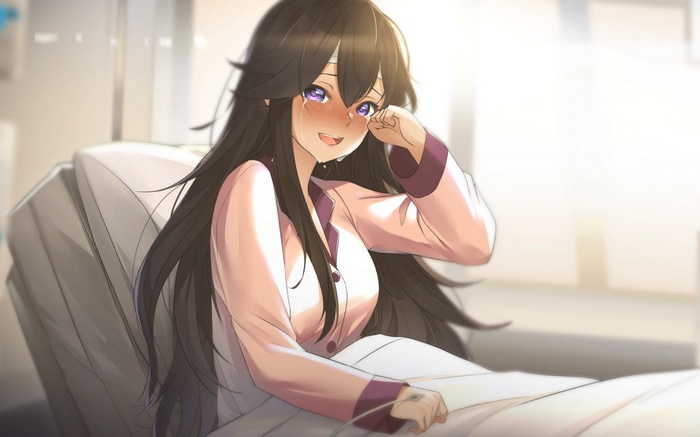 Girl crying in hospital bed