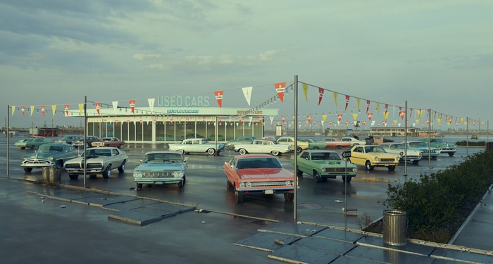 Vintage cars at a used car dealership