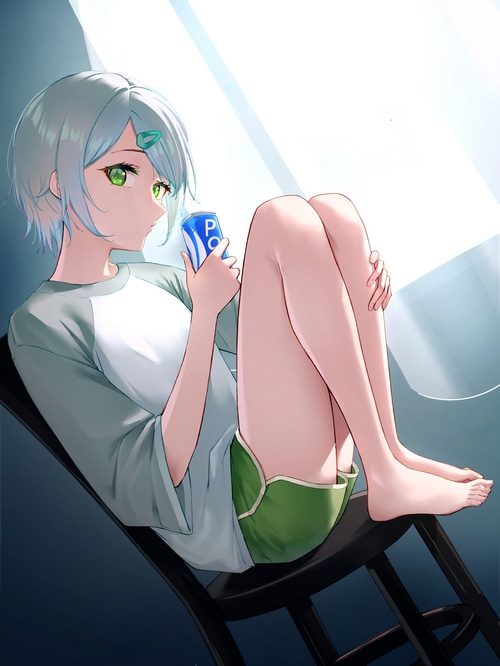 Girl with green eyes holding a soda can